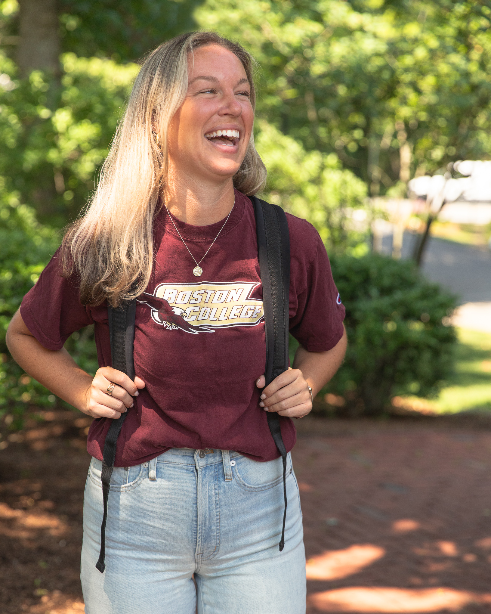 student wearing a boston college shirt