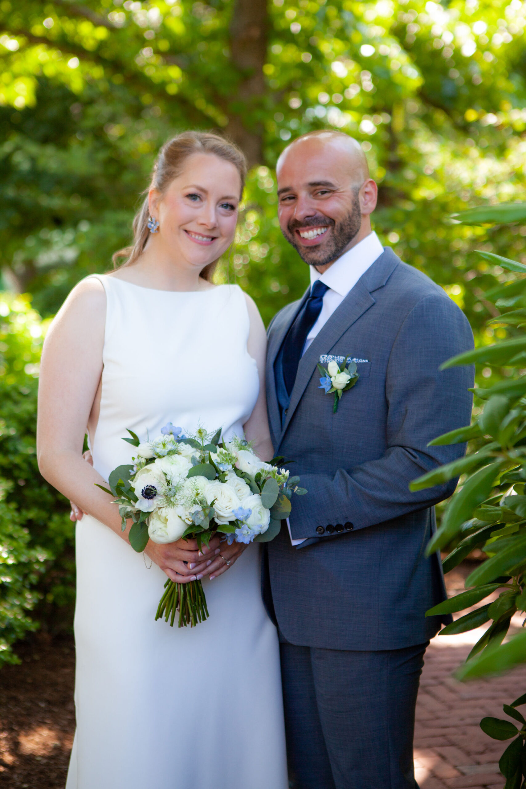 bride and groom posing